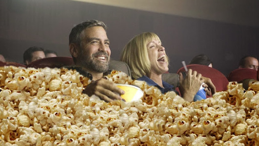 Feed george clooney eating popcorn at movies 64616